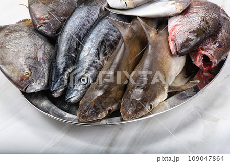 Raw fish mix for cooking 109047864