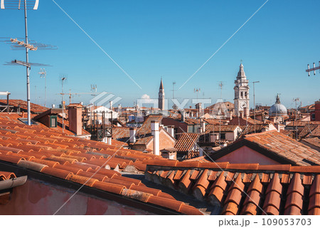 A breathtaking aerial view of Venice, Italy, showcasing its iconic canals, historic buildings, and unique architecture. 109053703