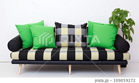 Cozy checkered sofa with green pillows. Interior design of a modern living room. Cozy checkered sofa with green pillows. Interior design of a modern living room. 109059272
