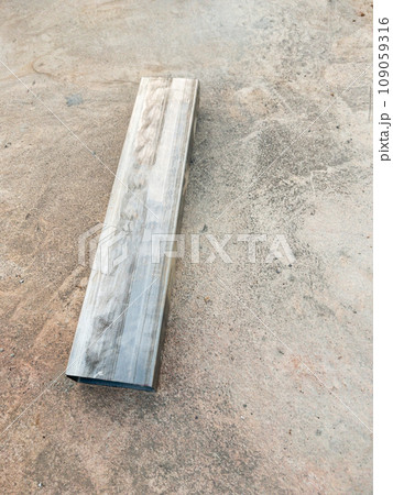 Closeup of the square steel pipe cut into pieces. 109059316
