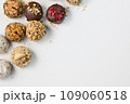 Set of round chocolate candies with nuts on a white background 109060518