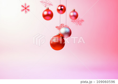 Abstract New Year and Christmas concept. New Year's balls are metallic silver and red. Balls hang on red strings. Red decorative flakes. A simple idea. Pastel pink and lilac background. Abstract New Year and Christmas concept. New Year's balls are metallic silver and red. Balls hang on red strings. Red decorative flakes. A simple idea. Pastel pink and lilac background. 109060596