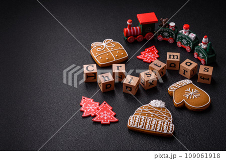 Beautiful Christmas composition with copy space with an inscription in wooden cubes 109061918