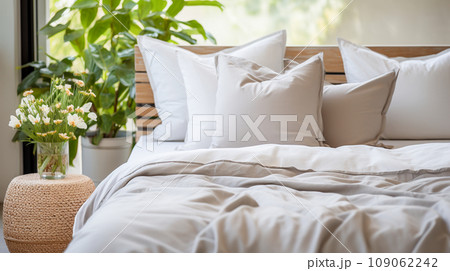 pillows on the bed in loft style bedroom 109062242