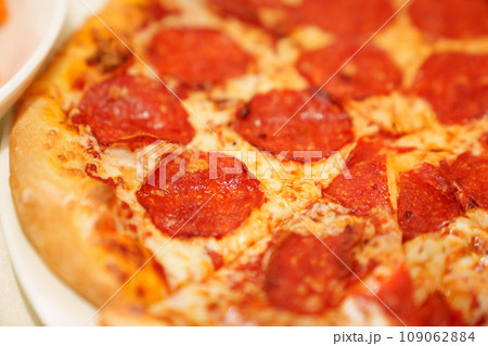Close-up of pepperoni pizza.  109062884