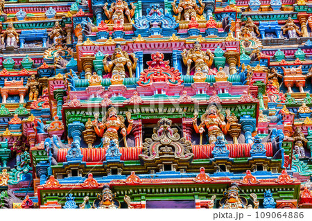 Sculptures on Hindu temple gopura tower. Meenakshi Temple, Madurai, Tamil Nadu, India 109064886