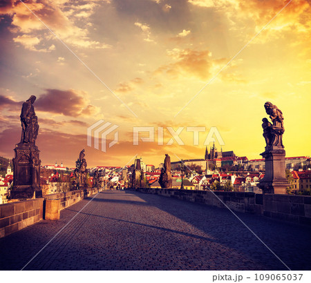 Vintage retro effect filtered hipster style travel image of Charles bridge and Prague castle in the early morning on surise. Prague, Czech Republic Vintage retro effect filtered hipster style travel image of Charles bridge and Prague castle in the early morning on surise. Prague, Czech Republic 109065037