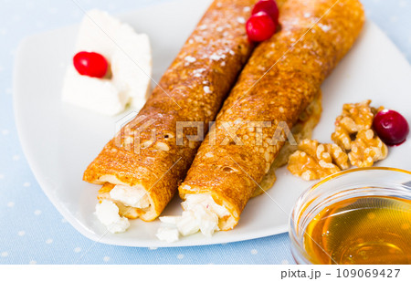 Bulgarian crepes Palatschinke on white dish Bulgarian crepes Palatschinke on white dish 109069427