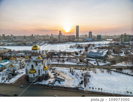 Winter Yekaterinburg and Temple on Blood in beautiful blue clear sunset. Aerial view of Yekaterinburg, Russia. Translation of the text on the temple Winter Yekaterinburg and Temple on Blood in beautiful blue clear sunset. Aerial view of Yekaterinburg, Russia. Translation of the text on the temple 109073000