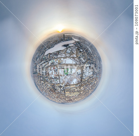 Aerial winter city view with crossroads and roads, houses, buildings, parks and bridges. Copter shot. Little planet sphere mode. 109073001