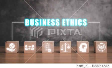 Business ethics concept, Wooden block on desk with business ethics icon on virtual screen. 109073282