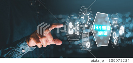 Performance review concept, Person hand touching performance review icon on virtual screen. Performance review concept, Person hand touching performance review icon on virtual screen. 109073284