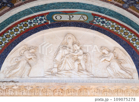 Madonna with the Child, by Andrea Gurdi lunette over the portal of Cathedral in Pisa, Italy. Unesco World Heritage Site Madonna with the Child, by Andrea Gurdi lunette over the portal of Cathedral in Pisa, Italy. Unesco World Heritage Site 109075278