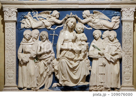 Madonna Enthroned, work by Luca della Robbia, Medici Chapel, Basilica di Santa Croce (Basilica of the Holy Cross) - famous Franciscan church in Florence, Italy Madonna Enthroned, work by Luca della Robbia, Medici Chapel, Basilica di Santa Croce (Basilica of the Holy Cross) - famous Franciscan church in Florence, Italy 109076080