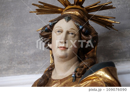 Saint Juliana, altar statue in the church of St. Agatha in Schmerlenbach, Germany Saint Juliana, altar statue in the church of St. Agatha in Schmerlenbach, Germany 109076090