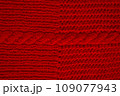 Handmade knitted background with detail wool threads. 109077943