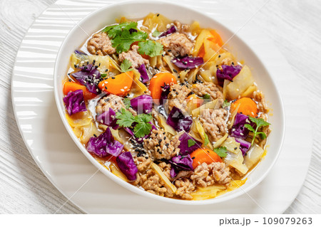 egg roll cabbage soup in bowl, top view egg roll cabbage soup in bowl, top view 109079263