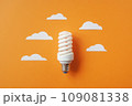 Light bulb with white cut out clouds. Idea concept 109081338