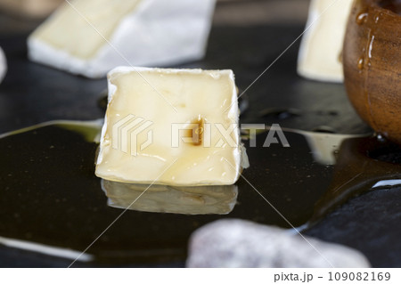 delicious soft cheese with white mold close-up 109082169