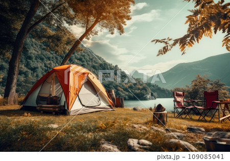 Camping and tent under the pine forest near the lake with beautiful sunlight in the morning 109085041