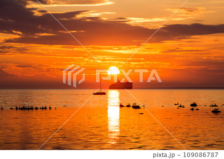 Cruise liner ship in sunset in sea 109086787