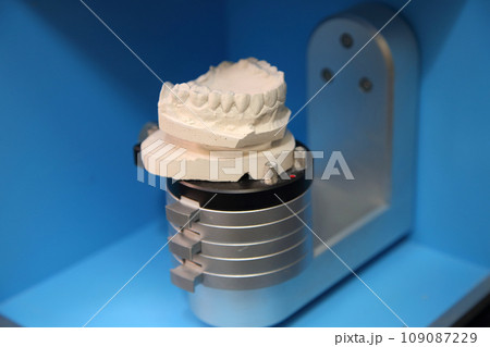 Fabrication of dental crowns and dentures made of ceramic. Scanning of plaster casts of teeth. Fabrication of ceramic dentures in a dental clinic. Ceramic dental crowns for implants. Fabrication of dental crowns and dentures made of ceramic. Scanning of plaster casts of teeth. Fabrication of ceramic dentures in a dental clinic. Ceramic dental crowns for implants. 109087229