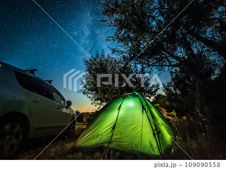 Night landscape with tent and car Night landscape with tent and car 109090558