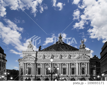 Opera Garnier (Garnier Palace) against the background of a beautiful sky with clouds, Paris, France. Translation Opera Garnier (Garnier Palace) against the background of a beautiful sky with clouds, Paris, France. Translation 109093171