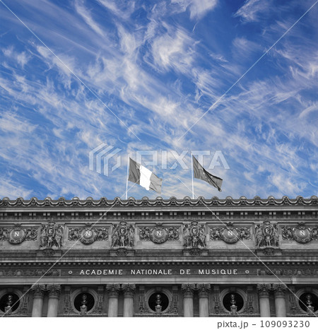 Opera Garnier (Garnier Palace) against the background of a beautiful sky with clouds, Paris, France. Translation Opera Garnier (Garnier Palace) against the background of a beautiful sky with clouds, Paris, France. Translation 109093230