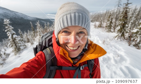 Traveler influencer taking selfie during travel in winter season comeliness 109097637