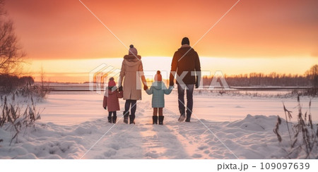 Happy family Father, mother and children are on winter walk in nature comeliness Happy family Father, mother and children are on winter walk in nature comeliness 109097639