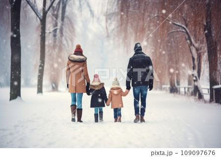 Happy family Father, mother and children are on winter walk in nature comeliness 109097676