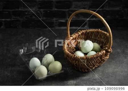 easter composition with eggs in basket easter composition with eggs in basket 109098996