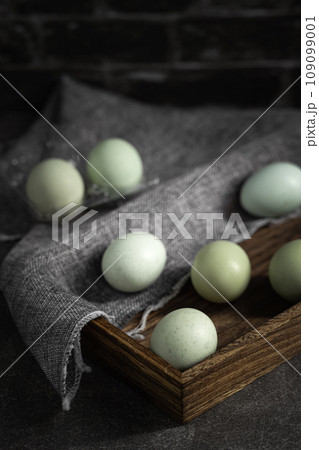 colorful easter eggs on dark background 109099001