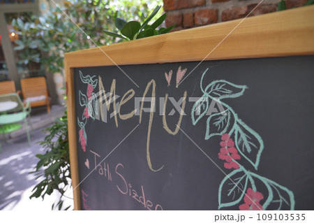 Cafe menu on black board outdoor Cafe menu on black board outdoor 109103535