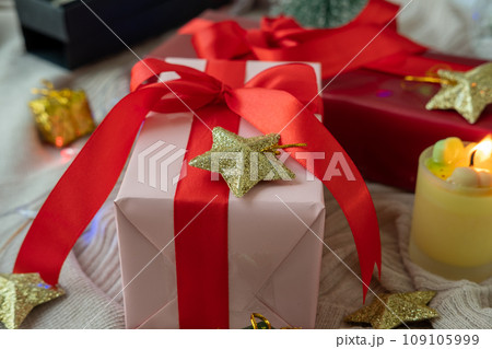 Christmas elements, gifts, fir branches, red decorations on white background. Christmas concept, winter, new year Christmas elements, gifts, fir branches, red decorations on white background. Christmas concept, winter, new year 109105999