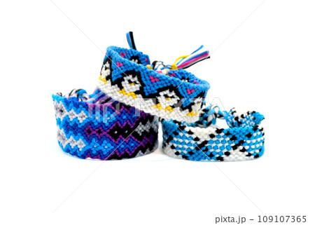 DIY woven tied friendship bracelet with unusual braiding. Summer accessory DIY woven tied friendship bracelet with unusual braiding. Summer accessory 109107365