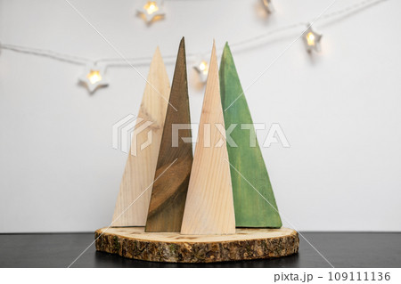 Alternative Christmas Tree. Easy Idea of Wooden Xmas Decoration. White Wood Wall. Handmade Nordic Decor. Boho Scandinavian Style Design. Unique DIY Minimal Ornament. Structural Origami. Zero Waste Fir Alternative Christmas Tree. Easy Idea of Wooden Xmas Decoration. White Wood Wall. Handmade Nordic Decor. Boho Scandinavian Style Design. Unique DIY Minimal Ornament. Structural Origami. Zero Waste Fir 109111136