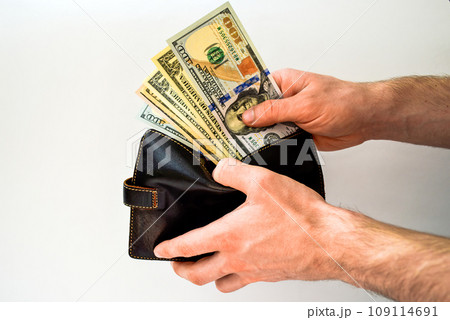 Black leather wallet with money usa dollars 109114691