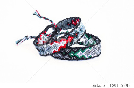 DIY woven friendship bracelets with different braiding. Summer accessory DIY woven friendship bracelets with different braiding. Summer accessory 109115292