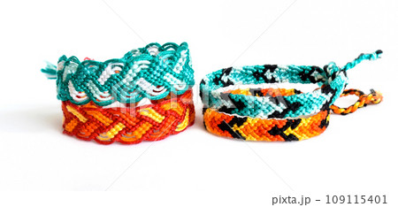 DIY woven friendship bracelets with different braiding. Summer accessory DIY woven friendship bracelets with different braiding. Summer accessory 109115401