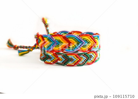 DIY woven friendship bracelets with different braiding. Summer accessory DIY woven friendship bracelets with different braiding. Summer accessory 109115710