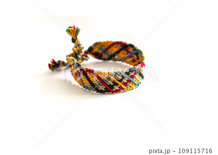 DIY woven friendship bracelets with different braiding. Summer accessory DIY woven friendship bracelets with different braiding. Summer accessory 109115716
