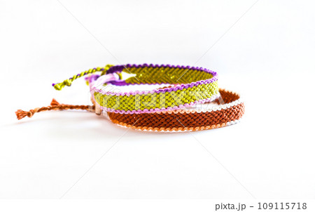 DIY woven friendship bracelets with different braiding. Summer accessory DIY woven friendship bracelets with different braiding. Summer accessory 109115718