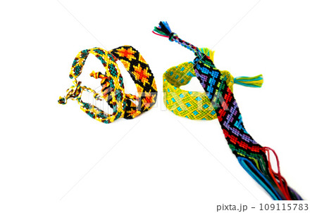 DIY woven friendship bracelets with different braiding. Summer accessory DIY woven friendship bracelets with different braiding. Summer accessory 109115783