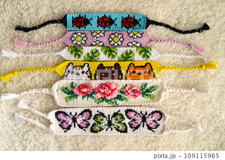 DIY woven friendship bracelets with different braiding. Summer accessory DIY woven friendship bracelets with different braiding. Summer accessory 109115965