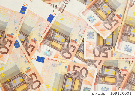 Euro banknotes as background, top view. Money and finance 109120001
