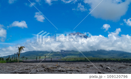 Eruption of Volcano Semeru on the island of Java. The volcano emits ash and smoke. Natural disaster. December 2022. Eruption of Volcano Semeru on the island of Java. The volcano emits ash and smoke. Natural disaster. December 2022. 109120796