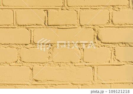 Light Yellow Bright Paint Warm Color Tint Brick Wall Texture Background Close-Up 109121218