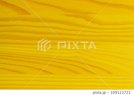 Bright yellow vibrant paint wooden board surface abstract plank pattern texture table floor background wood 109121721